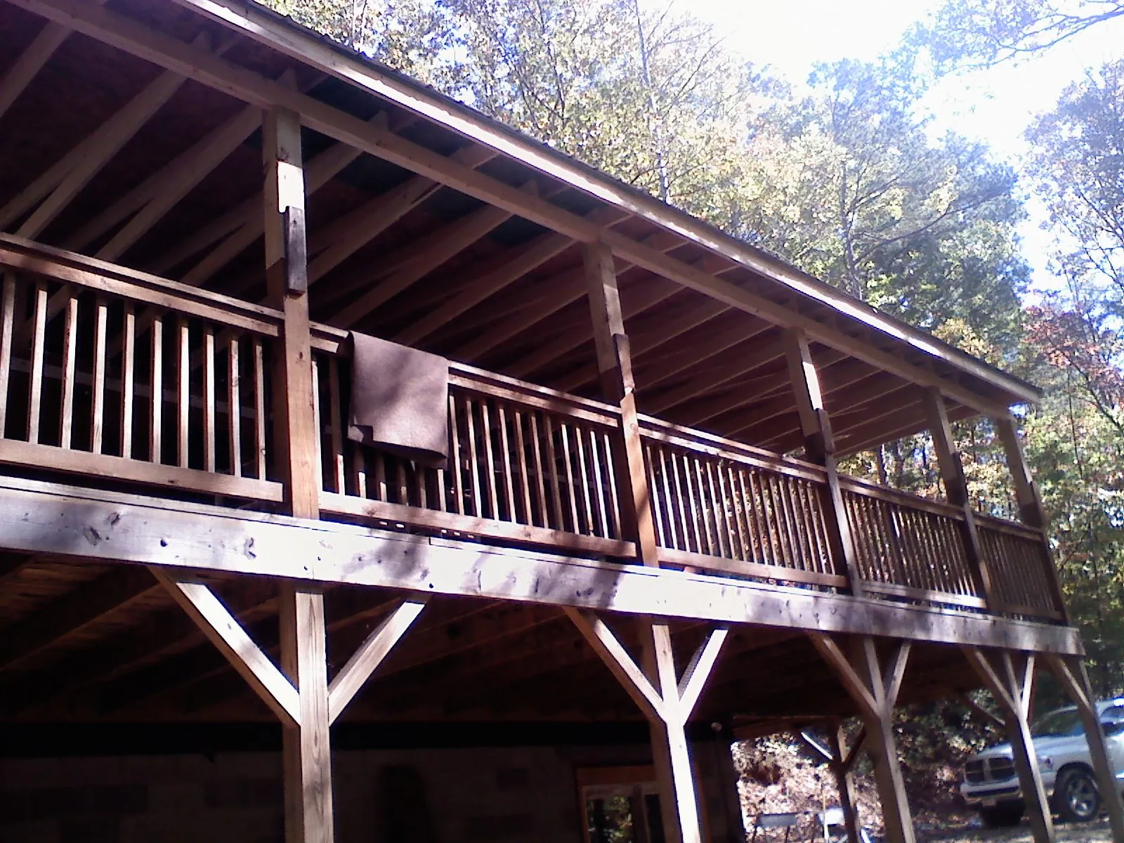 Timber framing under a new elevated porch and deck — Roof Leak Repair in Brent by Roofing Brothers